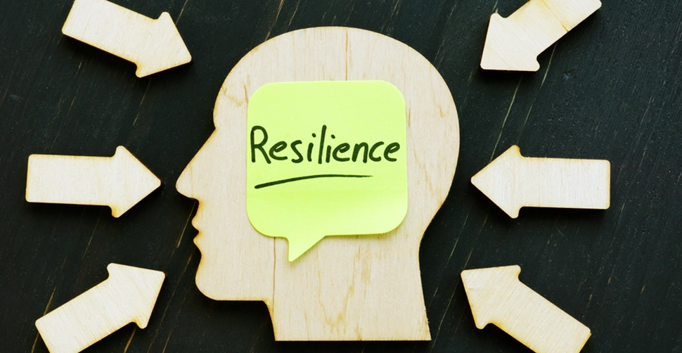 head showing the resilience in the workplace includes multiple factors like safety, wellbeing, and stress management