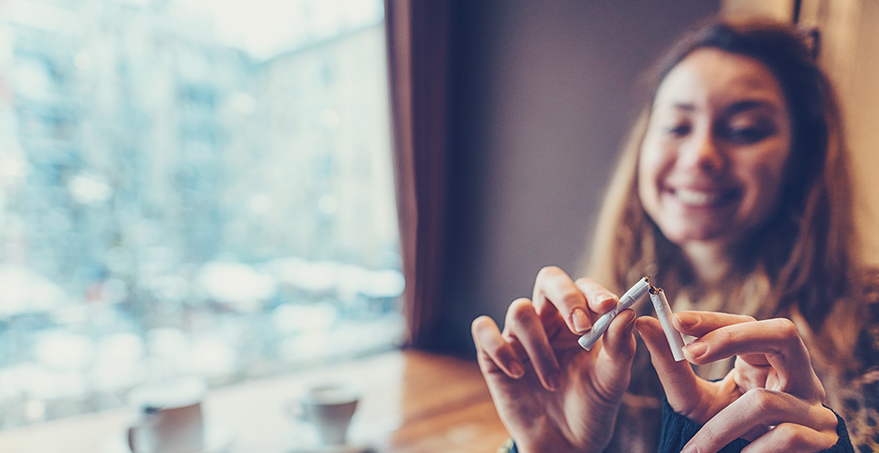 Woman demonstrating how to motivate someone to quit smoking by removing triggers