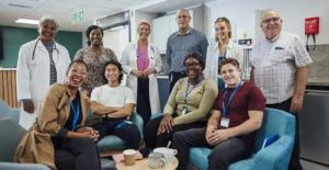 Healthcare workers from diverse roles and backgrounds, highlighting the broad need for support in quitting tobacco across all employees.